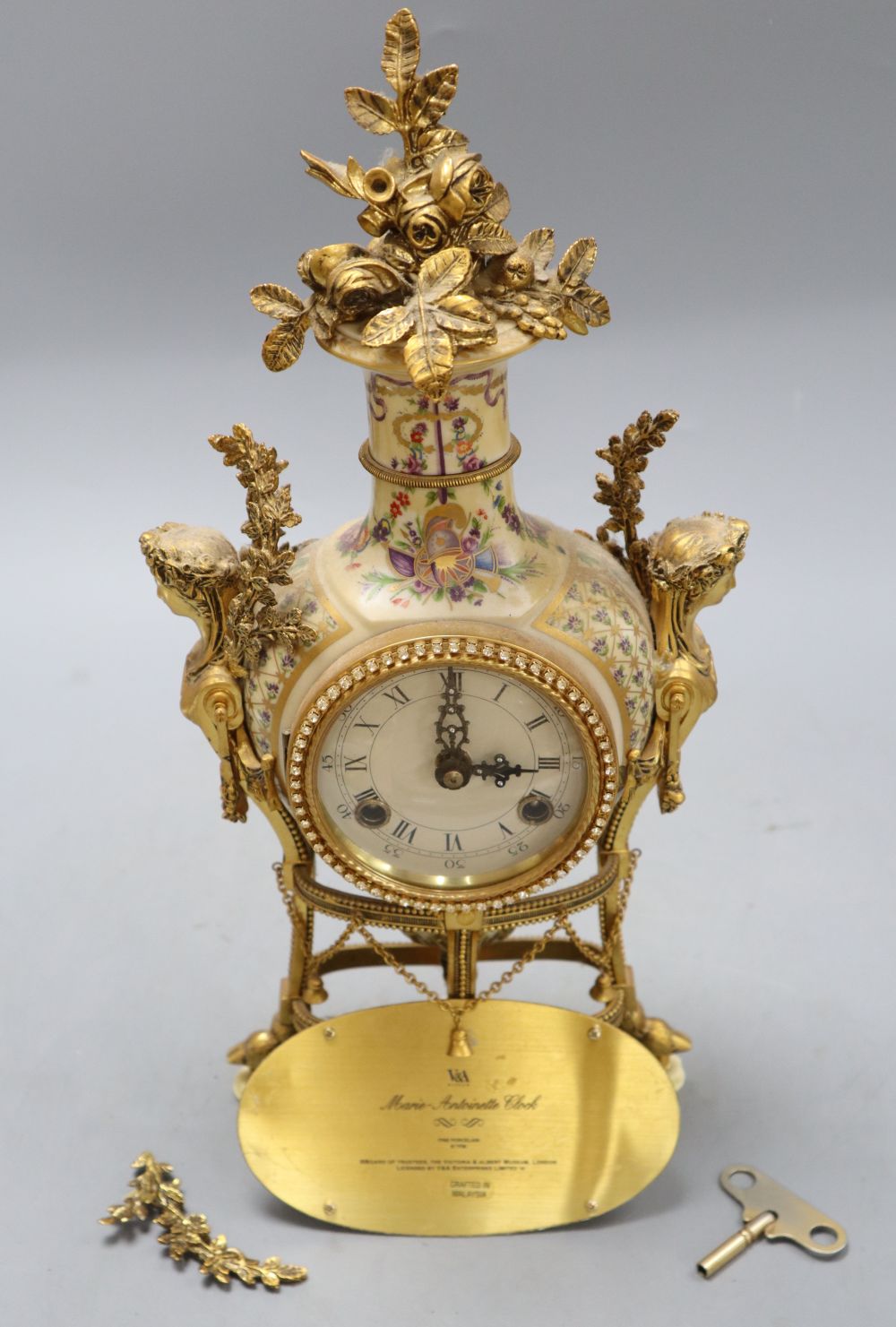 A Victoria & Albert Marie Antoinette mantel clock, height 38cm